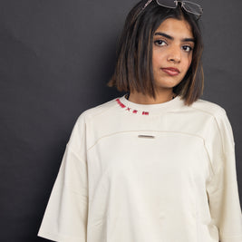 THE STITCH TEE — NUI CREAM