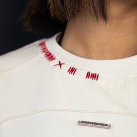 THE STITCH TEE — NUI CREAM