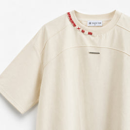 THE STITCH TEE — NUI CREAM