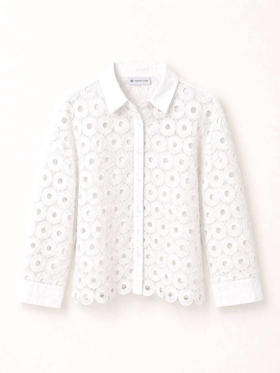 White shirt with a subtle pattern on a white background